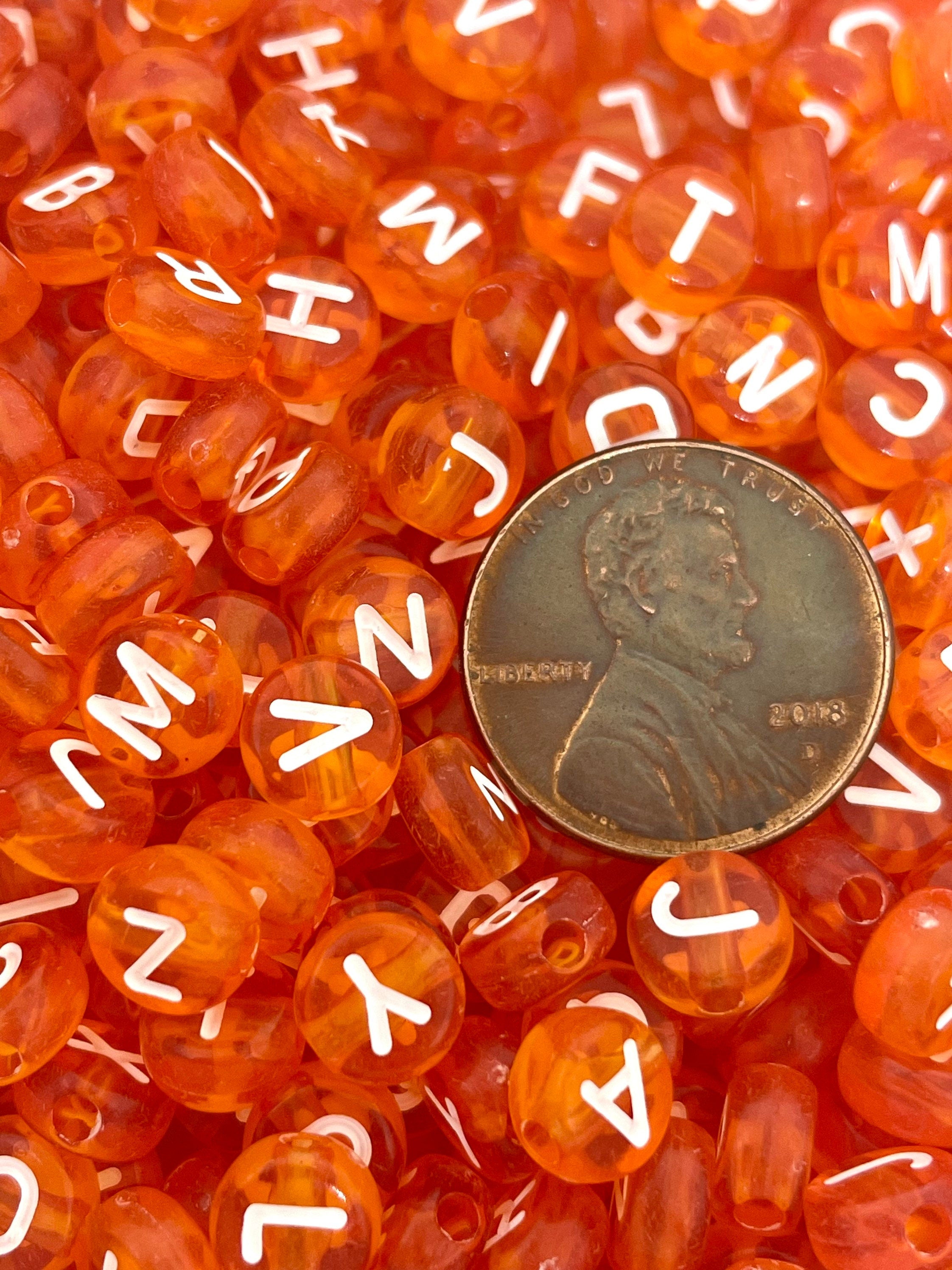 Translucent Orange Letter Beads: Spooky Alphabet for Halloween Crafts