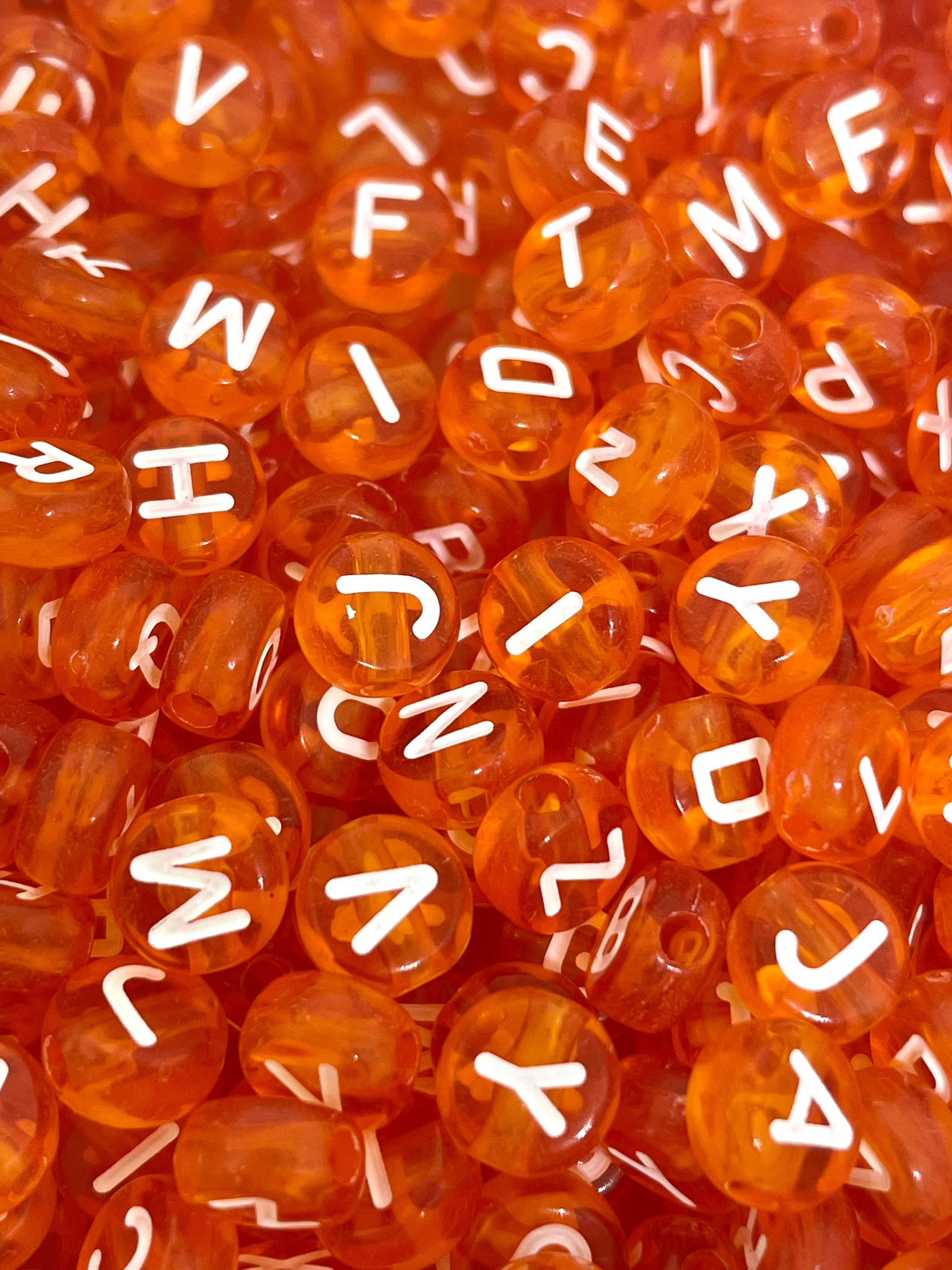 Translucent Orange Letter Beads: Spooky Alphabet for Halloween Crafts